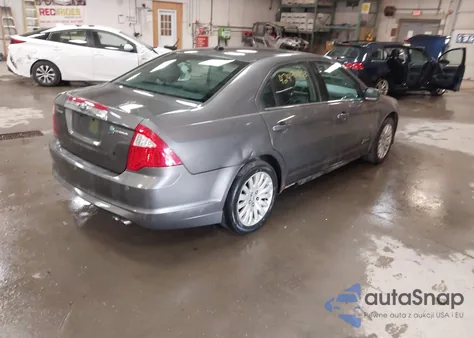 2011 Ford Fusion Hybrid из США, поврежденный, VIN 3FADP0L33BR314785